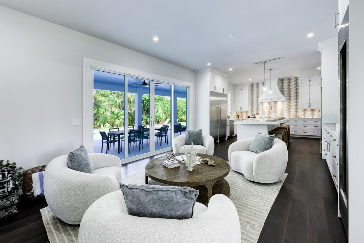Dining room, Interior, Kitchen, Living room, Pendant Lights, Recessed Lighting, Stainless Steel Appliances, Wood Texture Flooring