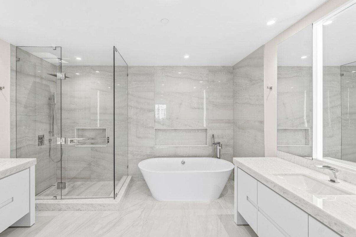 Bathroom, Dual Sink Vanities, Free Standing Baths, Glass Shower, Interior, Marble, Marble Walls, Recessed Lighting