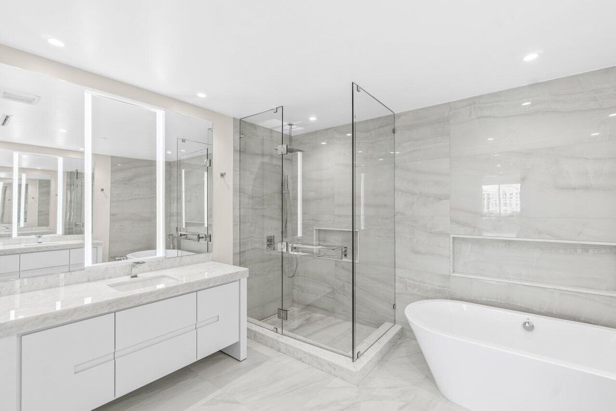 Bathroom, Dual Sink Vanities, Free Standing Baths, Glass Shower, Interior, Marble, Marble Walls, Recessed Lighting