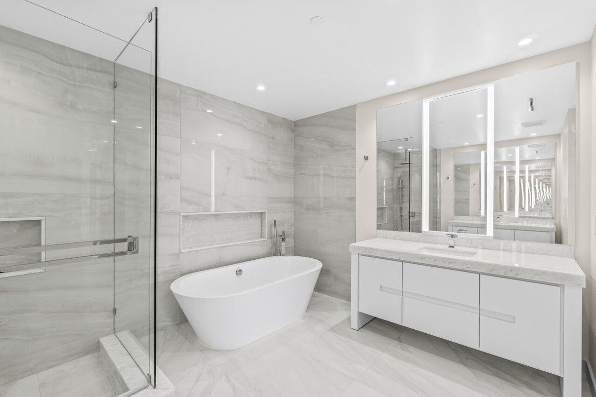 Bathroom, Dual Sink Vanities, Free Standing Baths, Glass Shower, Interior, Marble, Marble Walls, Recessed Lighting
