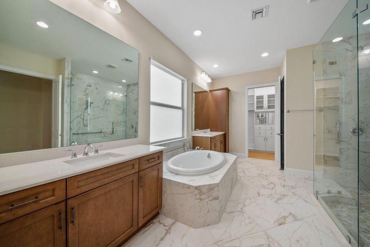Bathroom, Dual Sink Vanities, Glass Shower, Interior, Marble, Marble Walls, Recessed Lighting