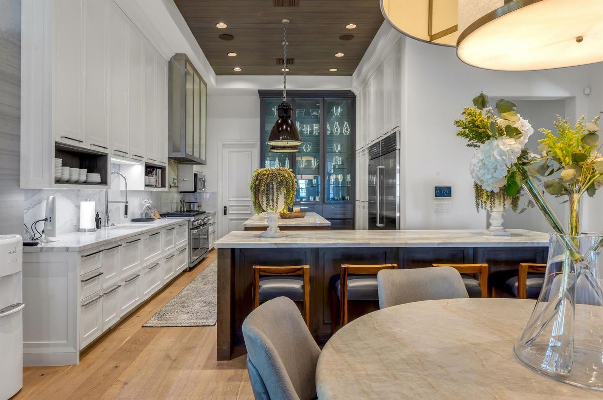 Dining room, Interior, Kitchen, Pendant Lights, Recessed Lighting, Stainless Steel Appliances, Wood Texture Flooring
