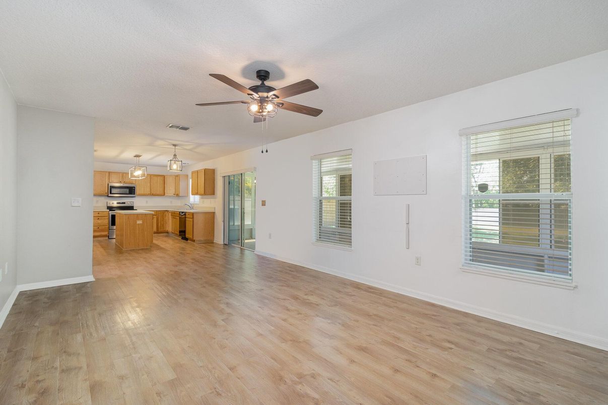 Empty room, Interior, Kitchen, Stainless Steel Appliances, Wood Texture Flooring
