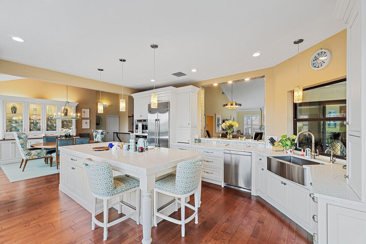 Dining room, Interior, Kitchen, Pendant Lights, Recessed Lighting, Stainless Steel Appliances, Wood Texture Flooring