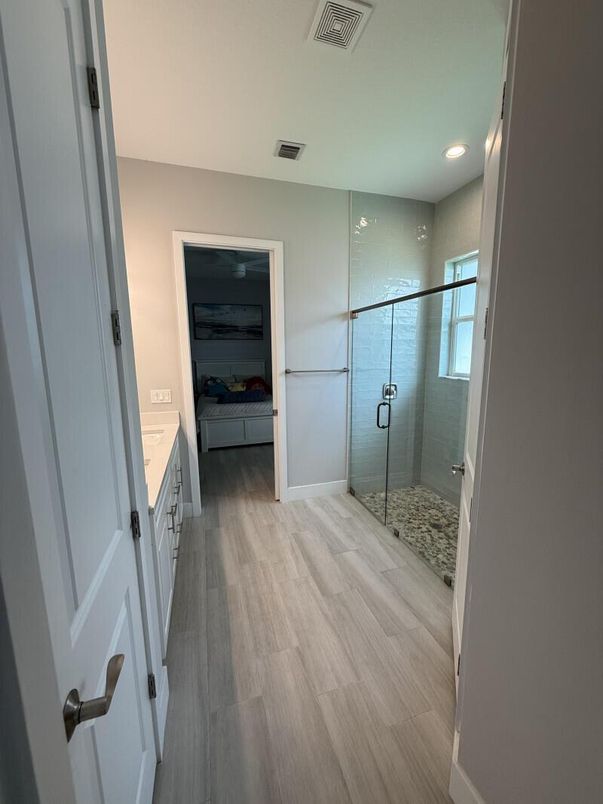 Bathroom, Glass Shower, Interior, Recessed Lighting, Wood Texture Flooring