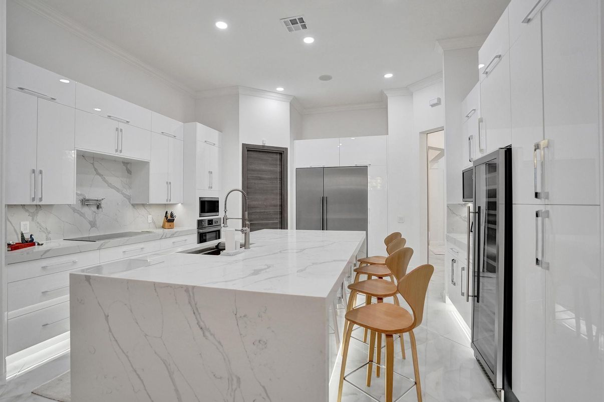 Interior, Kitchen, Marble Walls, Recessed Lighting, Stainless Steel Appliances