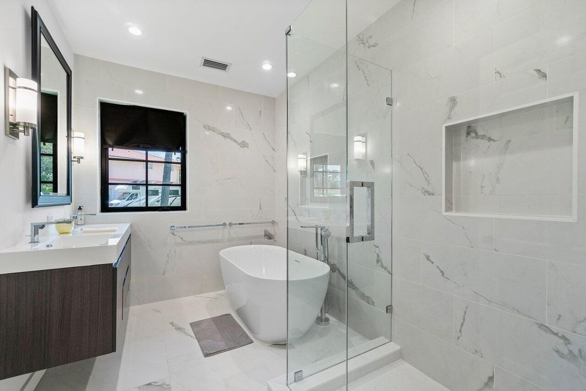 Bathroom, Dual Sink Vanities, Free Standing Baths, Glass Shower, Interior, Marble, Marble Walls, Recessed Lighting
