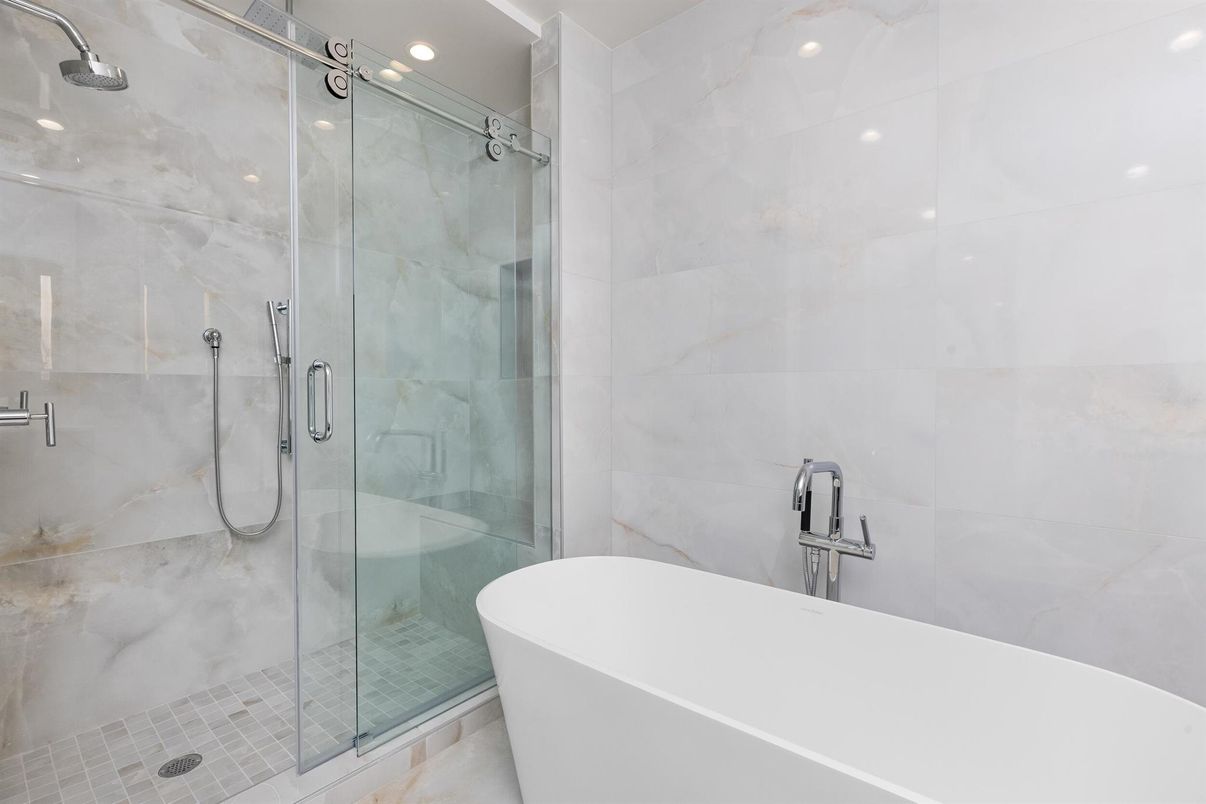 Bathroom, Free Standing Baths, Glass Shower, Interior, Marble Walls, Recessed Lighting
