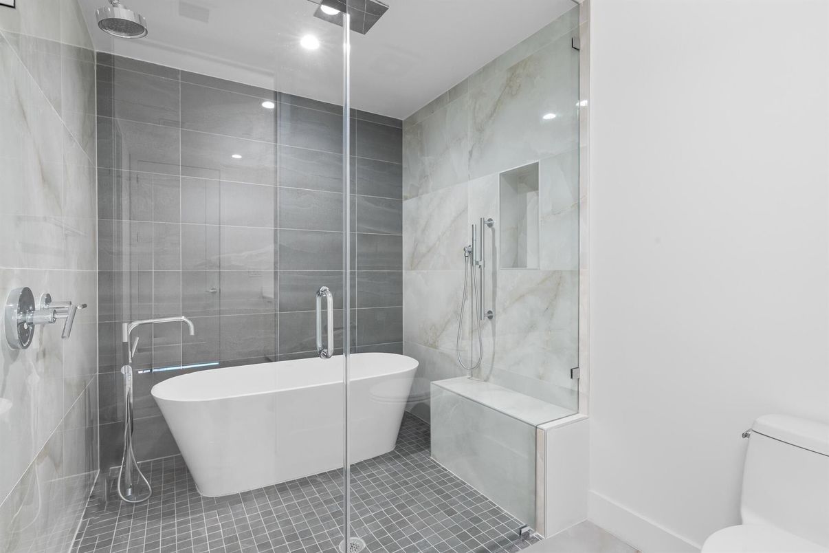 Bathroom, Free Standing Baths, Glass Shower, Interior, Marble Walls, Recessed Lighting