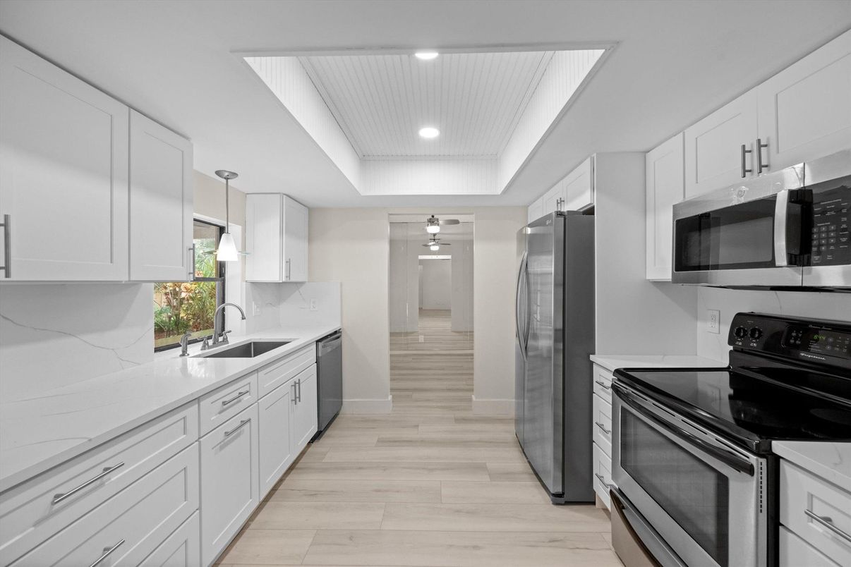 Interior, Kitchen, Pendant Lights, Recessed Lighting, Stainless Steel Appliances, Wood Texture Flooring