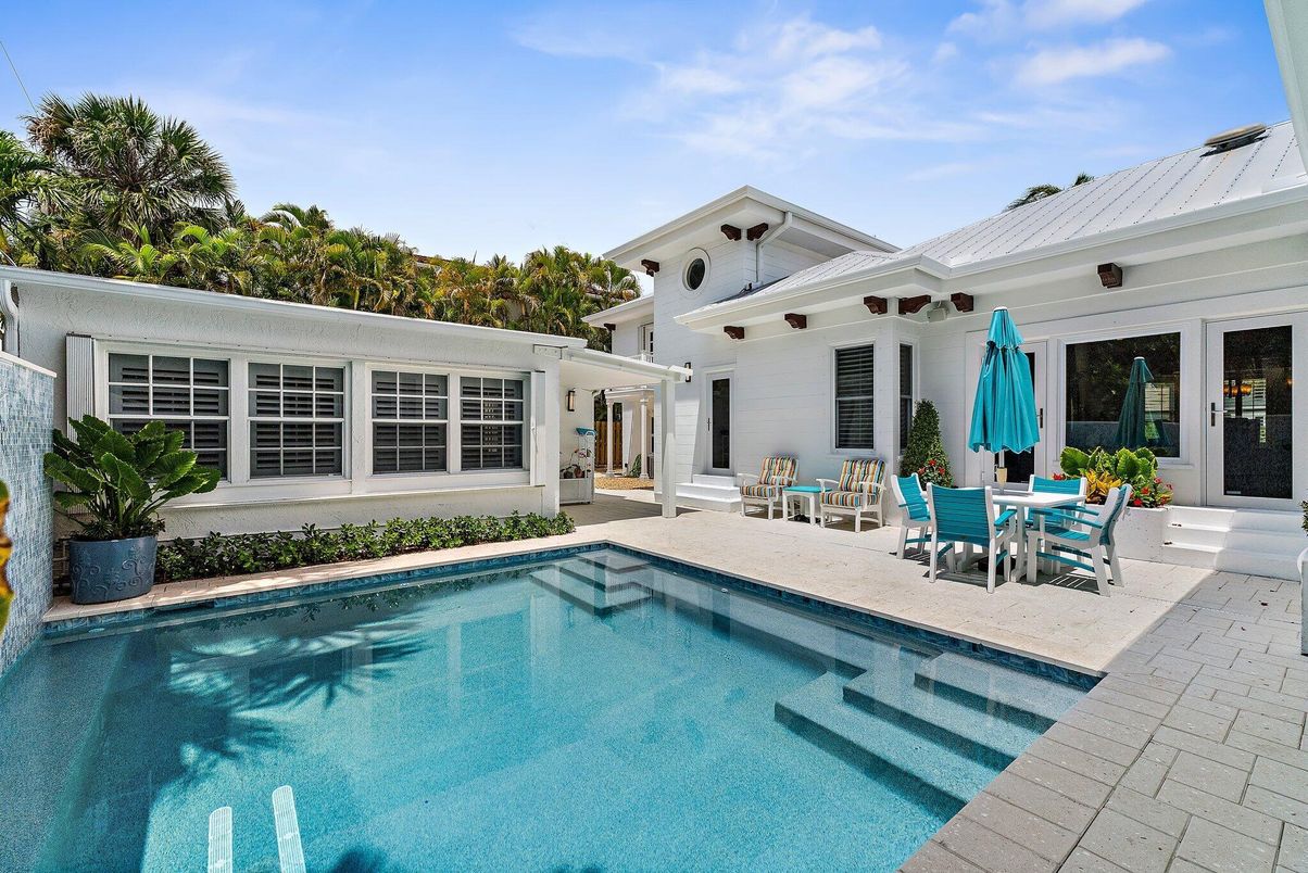Exterior, Pool, Solar Panels