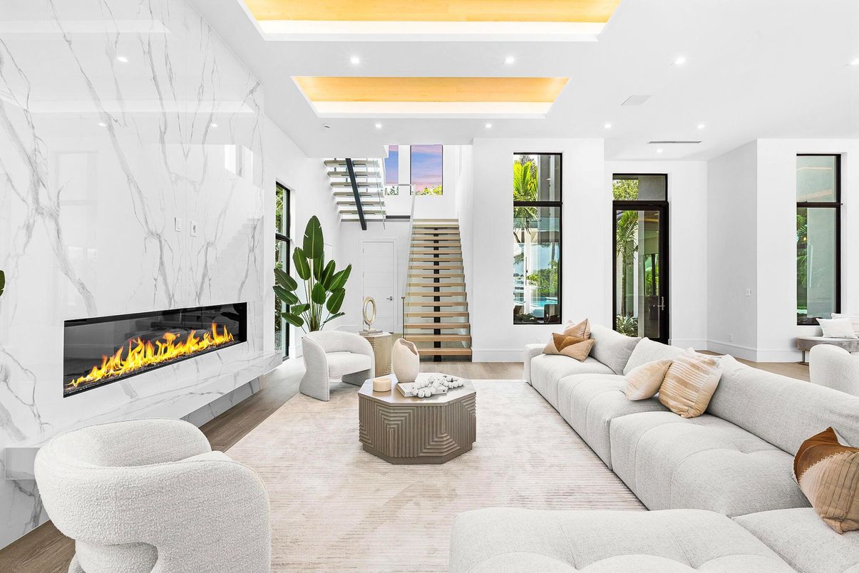Fireplace, Interior, Living room, Marble Walls, Recessed Lighting, Wood Texture Flooring