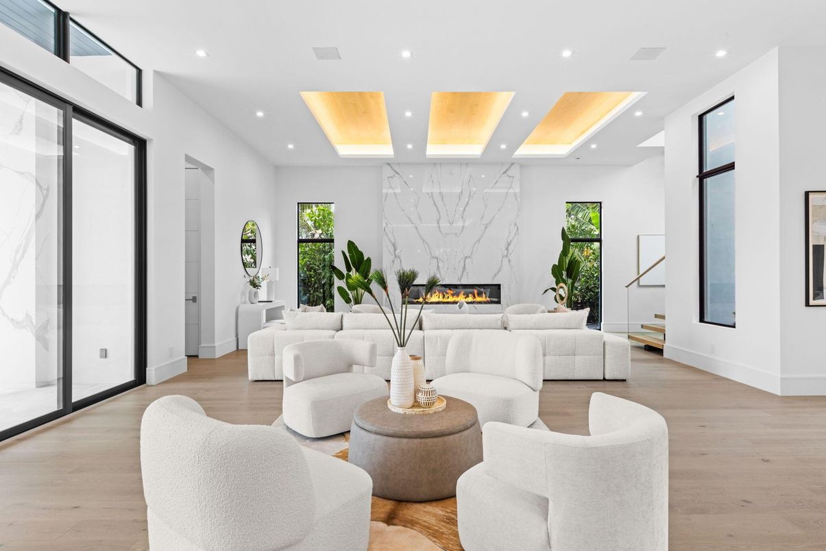 Fireplace, Interior, Living room, Marble Walls, Recessed Lighting, Wood Texture Flooring