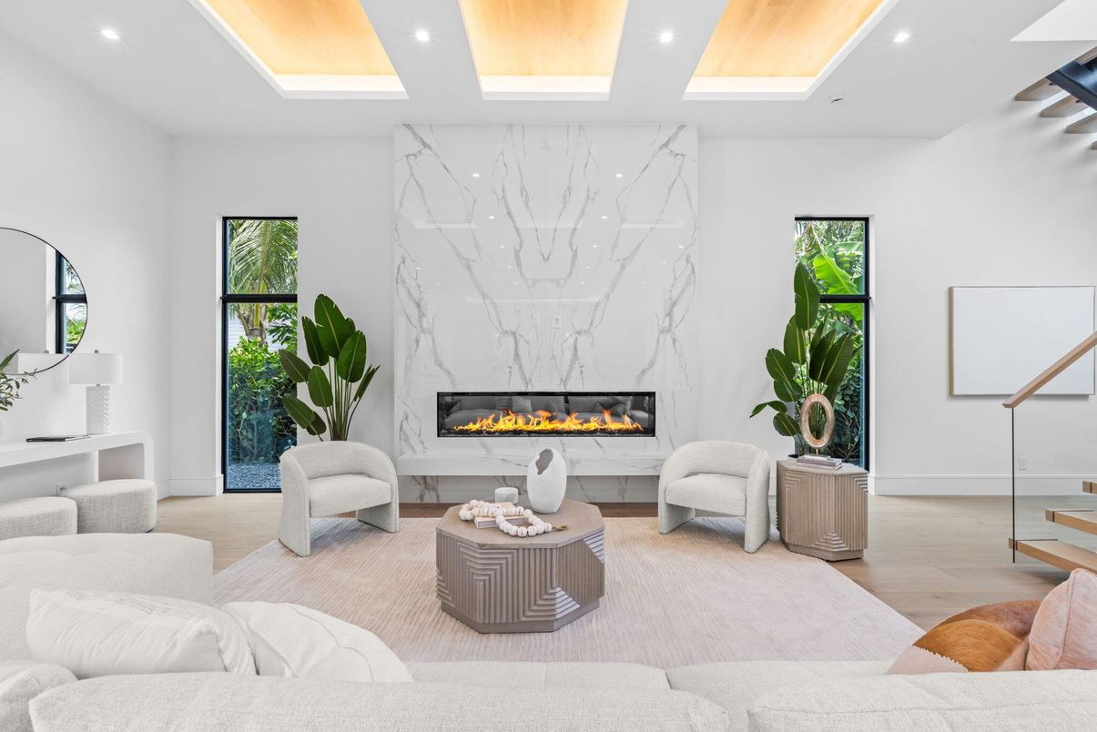 Fireplace, Interior, Living room, Marble Walls, Recessed Lighting, Wood Texture Flooring