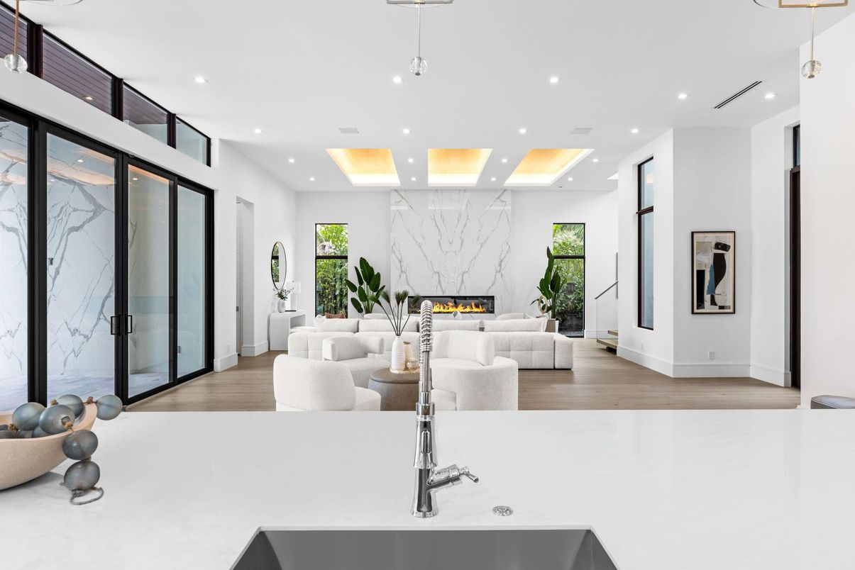 Fireplace, Interior, Living room, Marble Walls, Recessed Lighting, Wood Texture Flooring