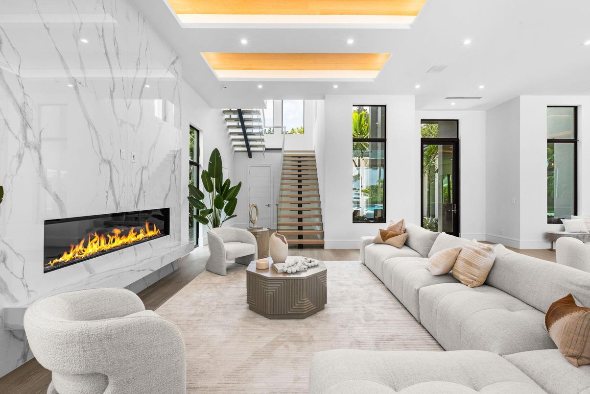 Fireplace, Interior, Living room, Marble Walls, Recessed Lighting, Wood Texture Flooring