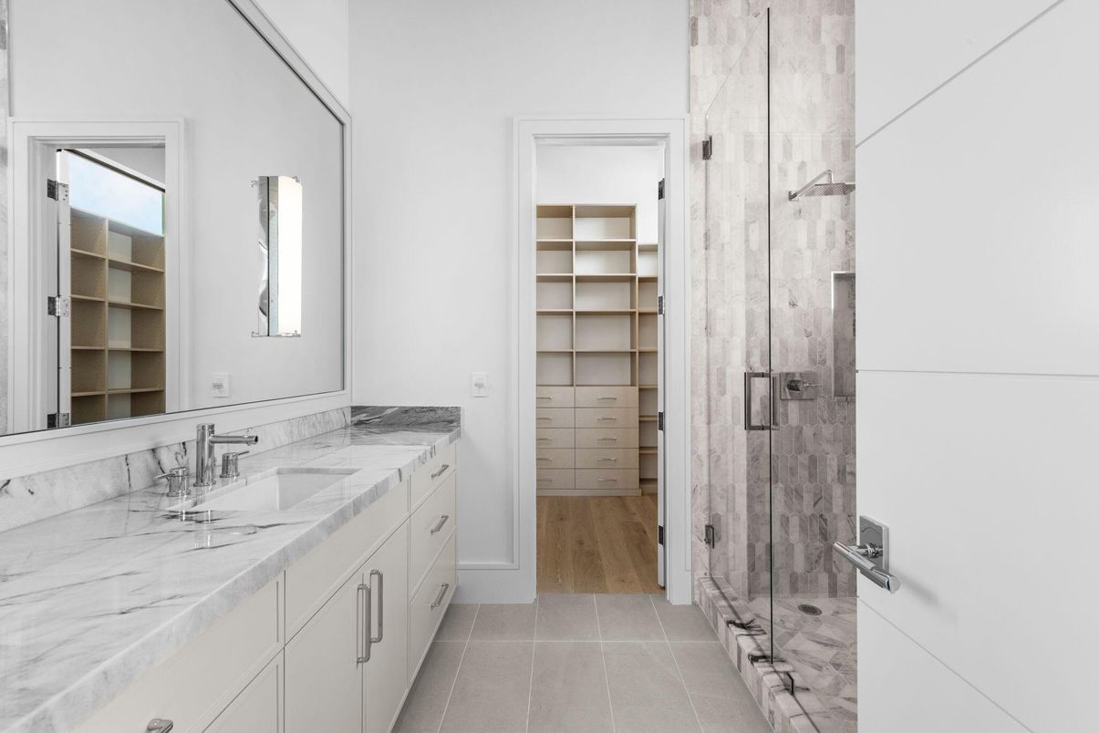 Bathroom, Dual Sink Vanities, Glass Shower, Interior, Walk-in Closets, Wood Texture Flooring