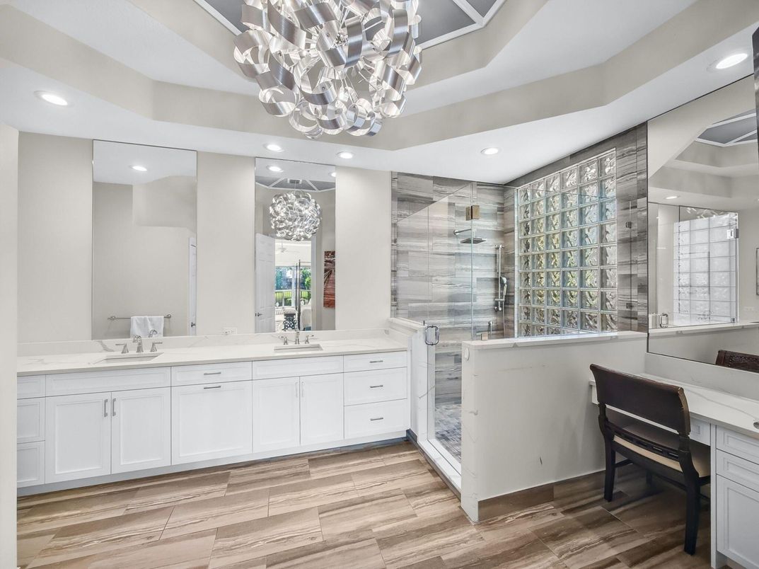 Bathroom, Chandelier, Dual Sink Vanities, Interior, Recessed Lighting, Wood Texture Flooring