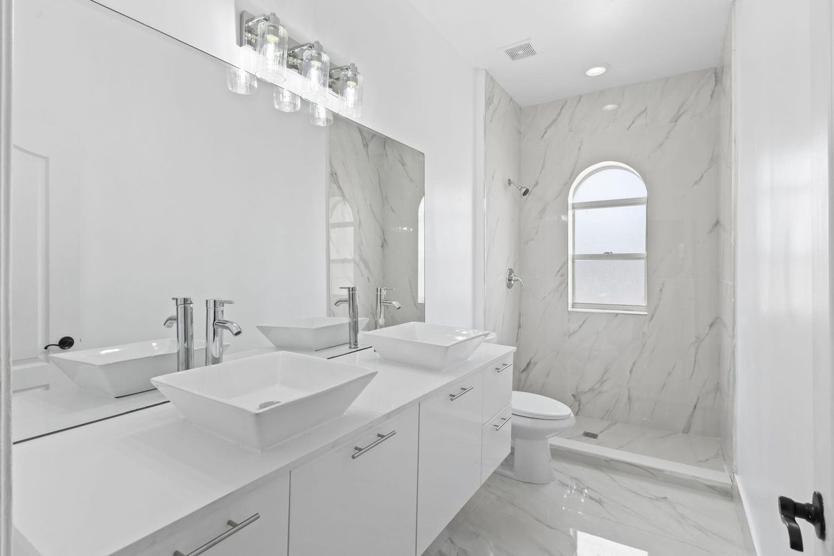 Bathroom, Dual Sink Vanities, Interior, Marble, Marble Walls, Recessed Lighting