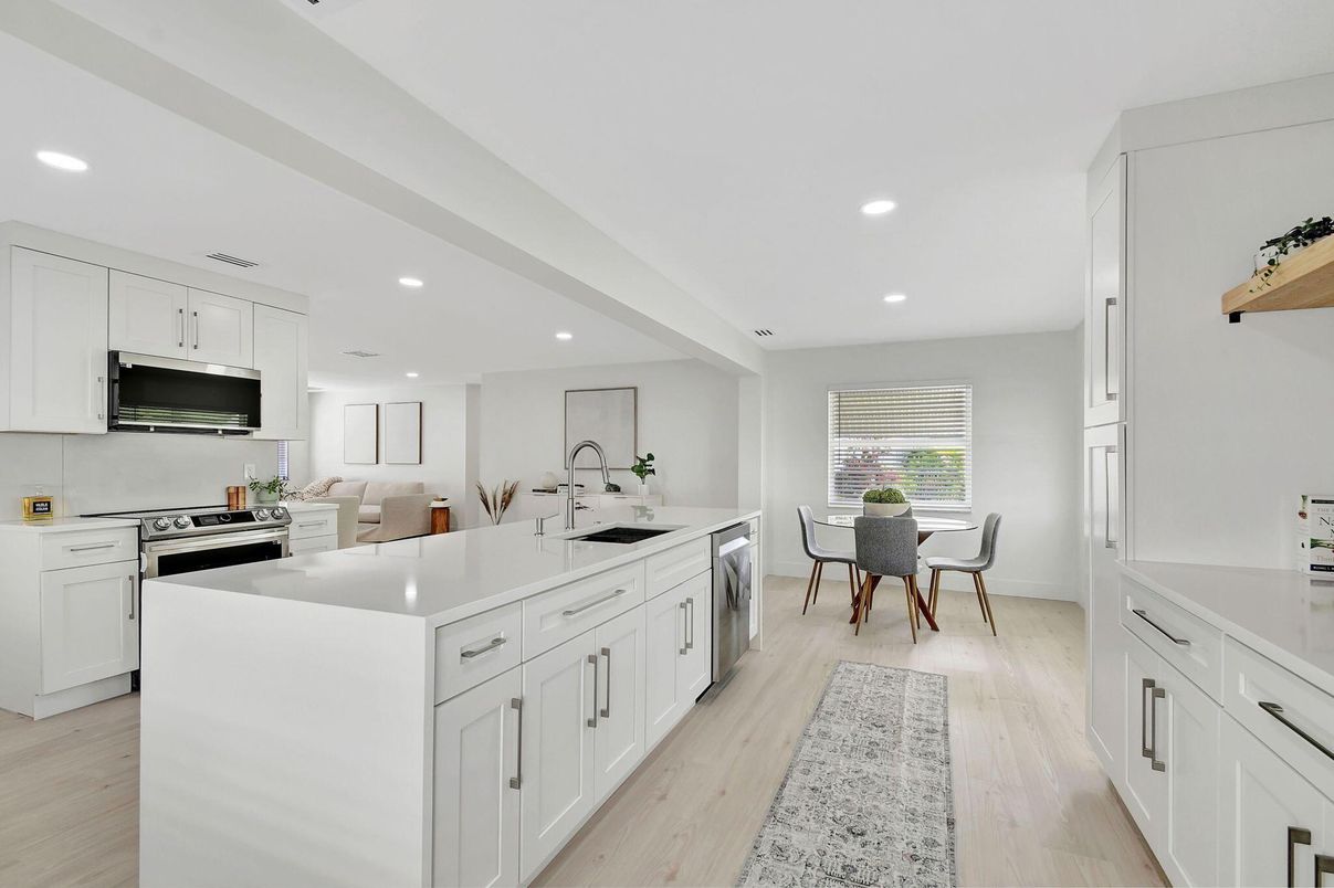 Dining room, Interior, Kitchen, Recessed Lighting, Stainless Steel Appliances, Wood Texture Flooring