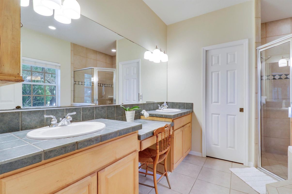 Bathroom, Dual Sink Vanities, Glass Shower, Interior, Recessed Lighting, Tile Countertops