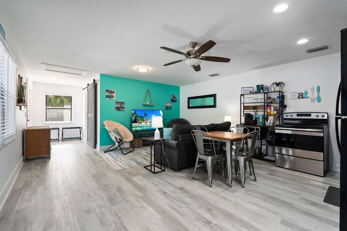 Dining room, Interior, Kitchen, Recessed Lighting, Stainless Steel Appliances, Wood Texture Flooring