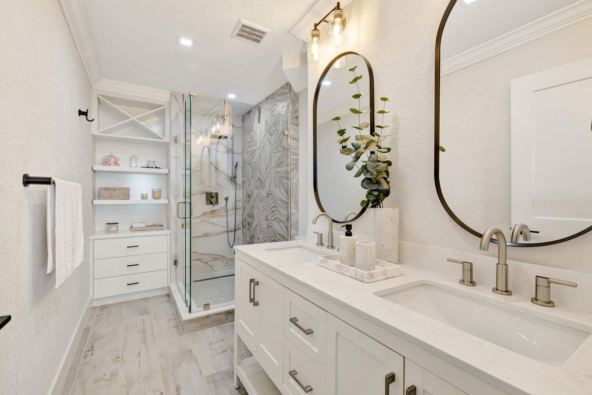 Bathroom, Dual Sink Vanities, Glass Shower, Interior, Marble, Marble Walls, Recessed Lighting