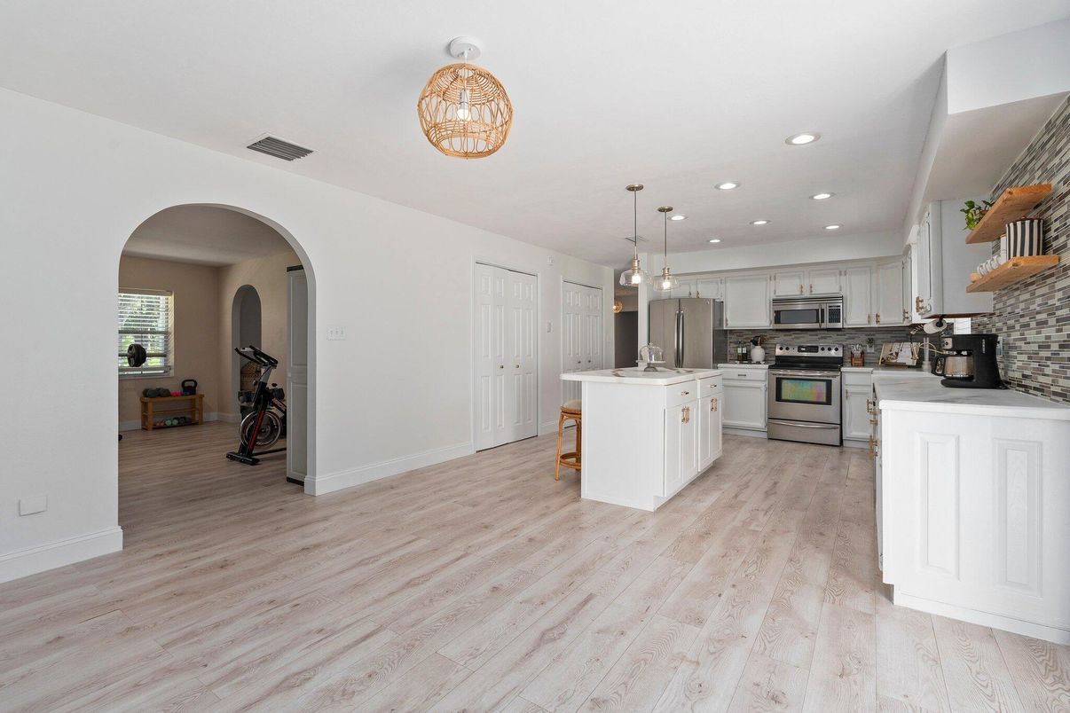 Interior, Kitchen, Pendant Lights, Recessed Lighting, Stainless Steel Appliances, Wood Texture Flooring