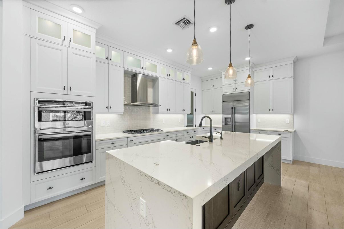 Interior, Kitchen, Pendant Lights, Recessed Lighting, Stainless Steel Appliances, Wood Texture Flooring