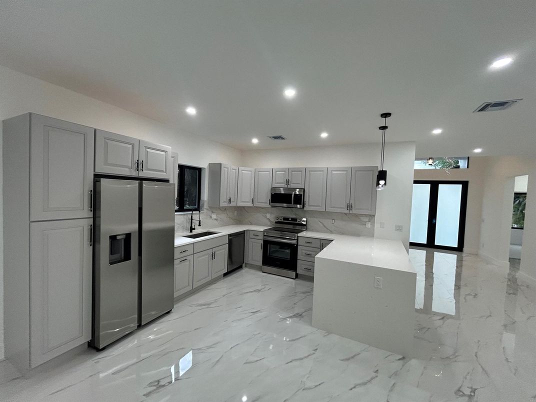 Interior, Kitchen, Marble, Pendant Lights, Recessed Lighting, Stainless Steel Appliances