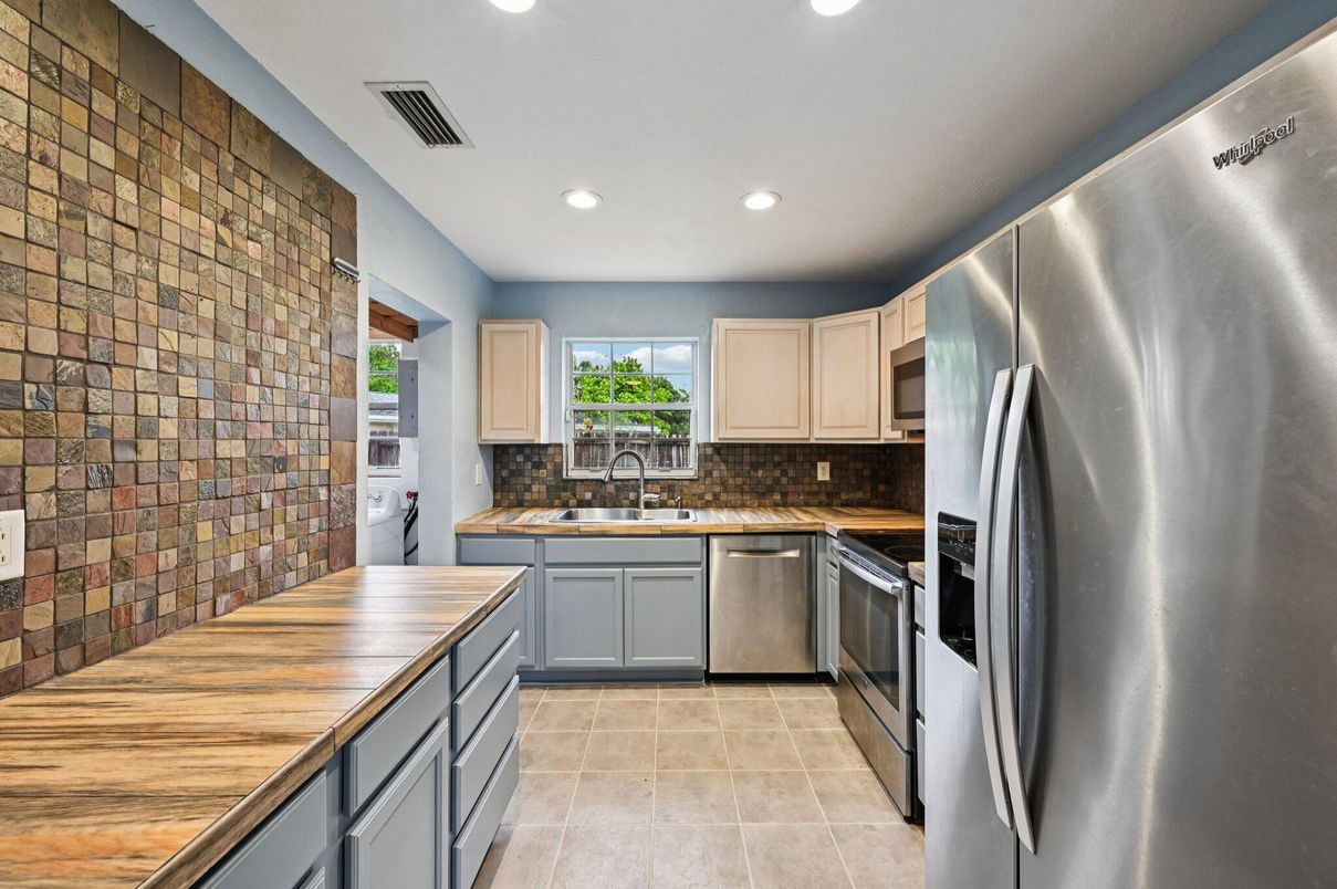 Interior, Kitchen, Recessed Lighting, Stainless Steel Appliances, Stone Walls