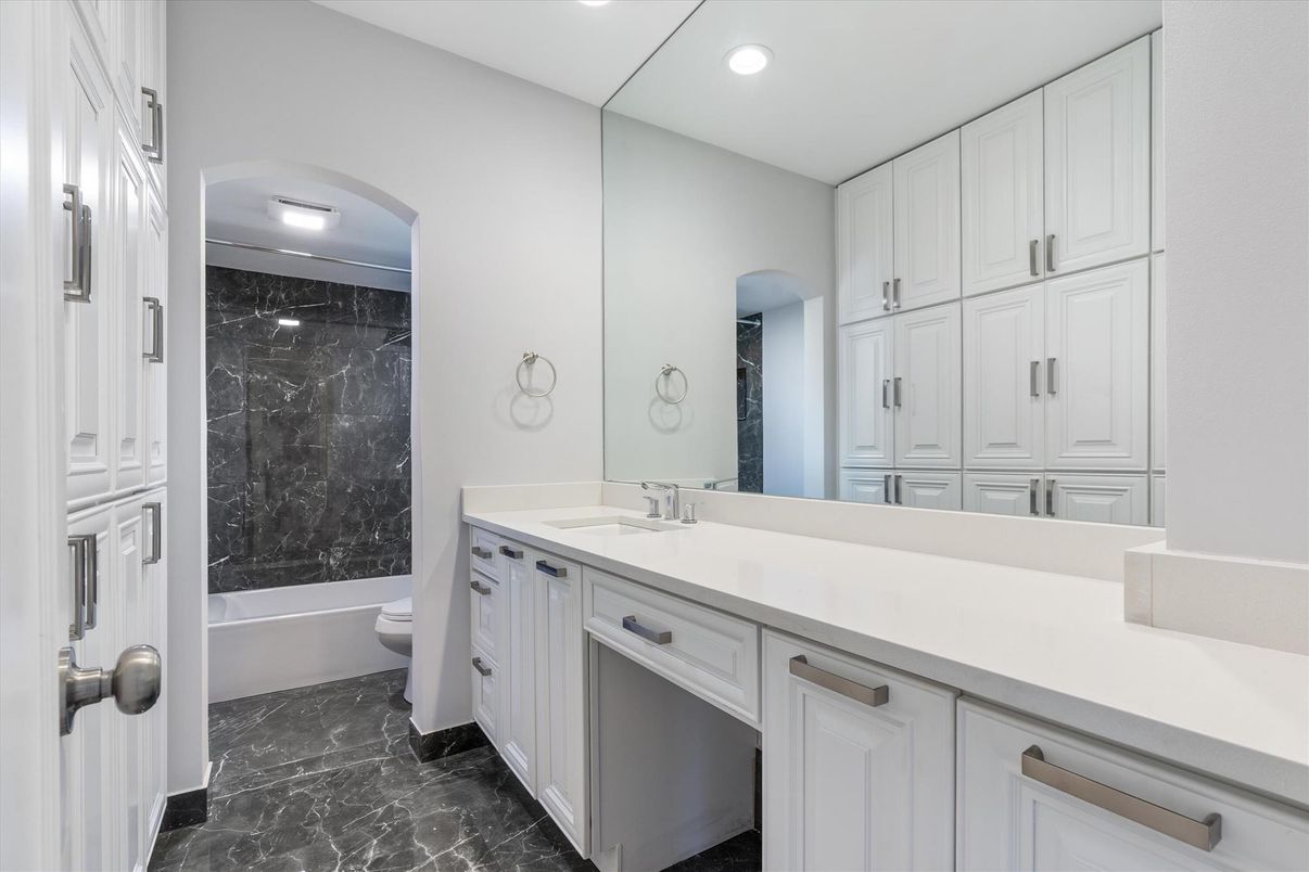 Bathroom, Dual Sink Vanities, Interior, Marble, Marble Walls, Recessed Lighting