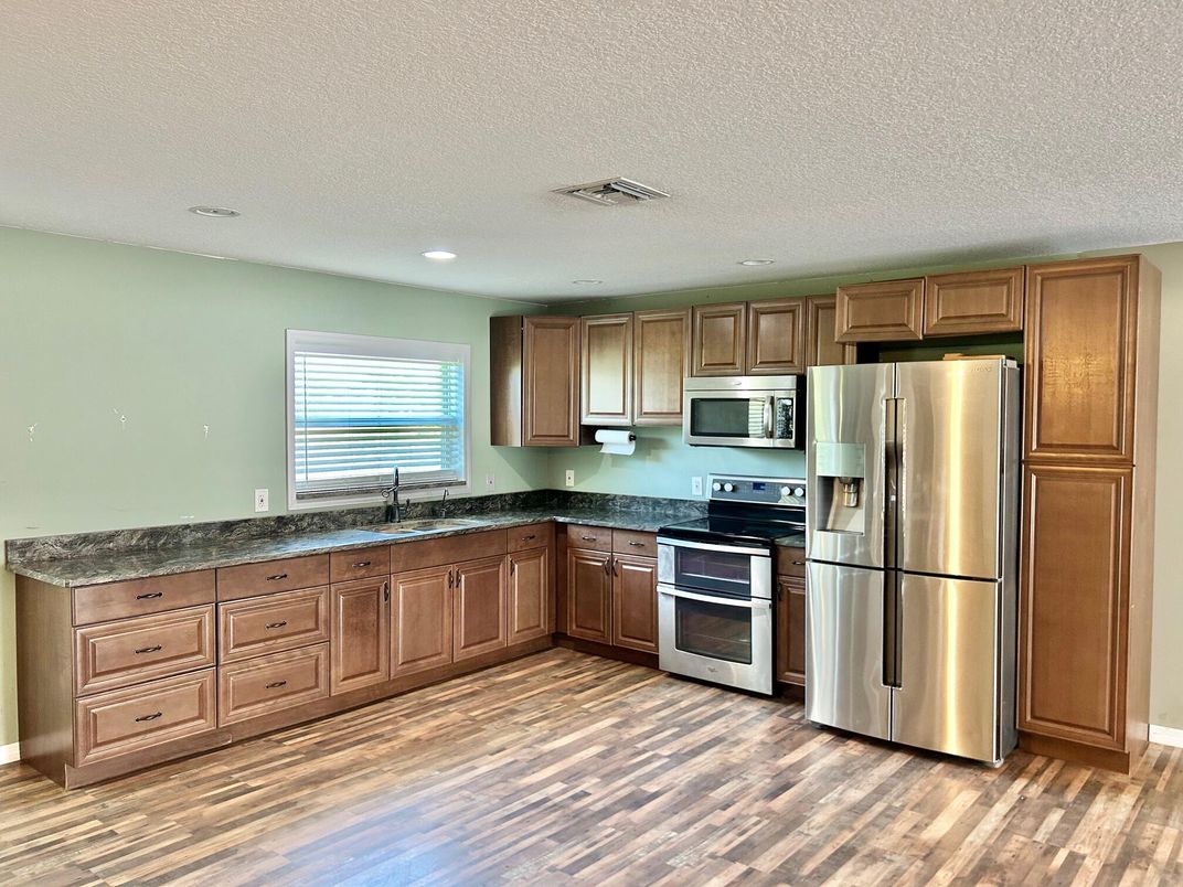 Interior, Kitchen, Recessed Lighting, Stainless Steel Appliances, Wood Texture Flooring