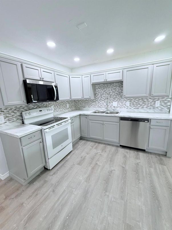 Interior, Kitchen, Recessed Lighting, Stainless Steel Appliances, Wood Texture Flooring