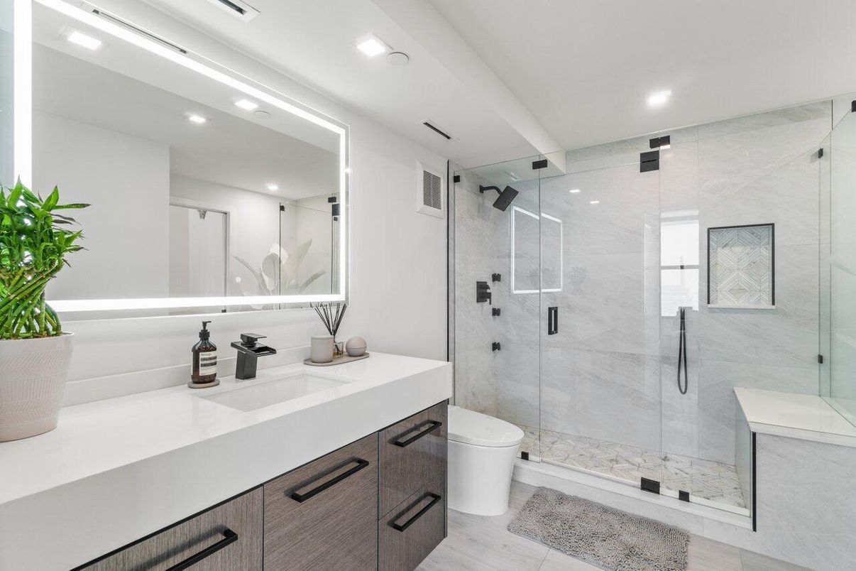 Bathroom, Dual Sink Vanities, Glass Shower, Interior, Marble Walls, Recessed Lighting