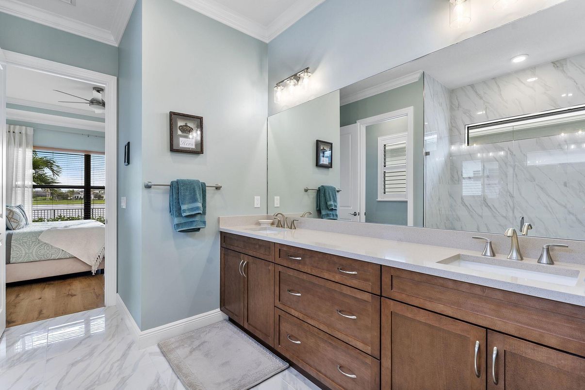 Bathroom, Bedroom, Dual Sink Vanities, Interior, Marble, Marble Walls, Recessed Lighting, Wood Texture Flooring