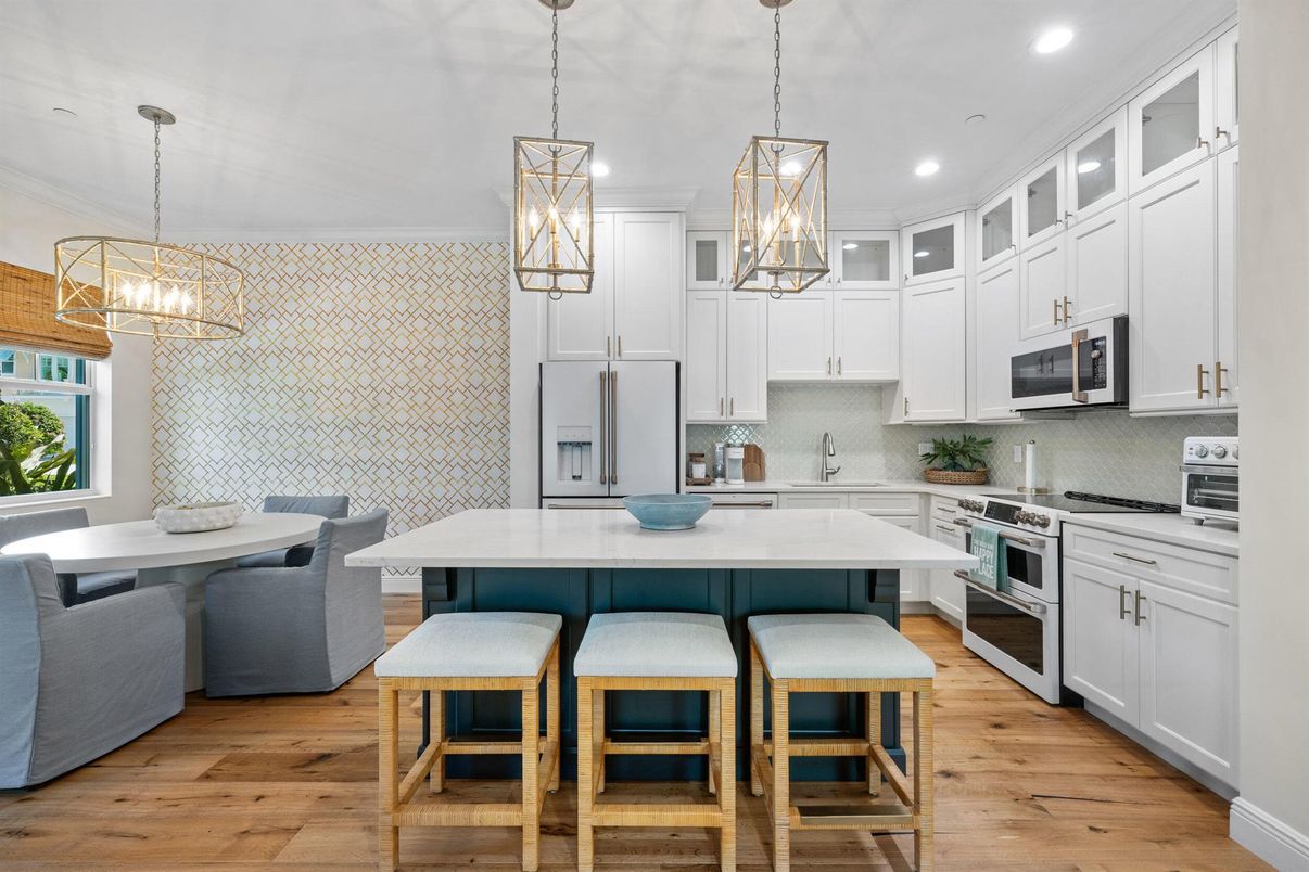 Dining room, Interior, Kitchen, Pendant Lights, Recessed Lighting, Stainless Steel Appliances, Wood Texture Flooring