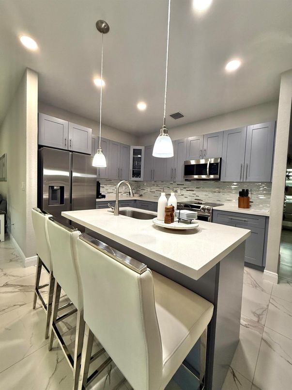 Interior, Kitchen, Marble, Pendant Lights, Recessed Lighting, Stainless Steel Appliances