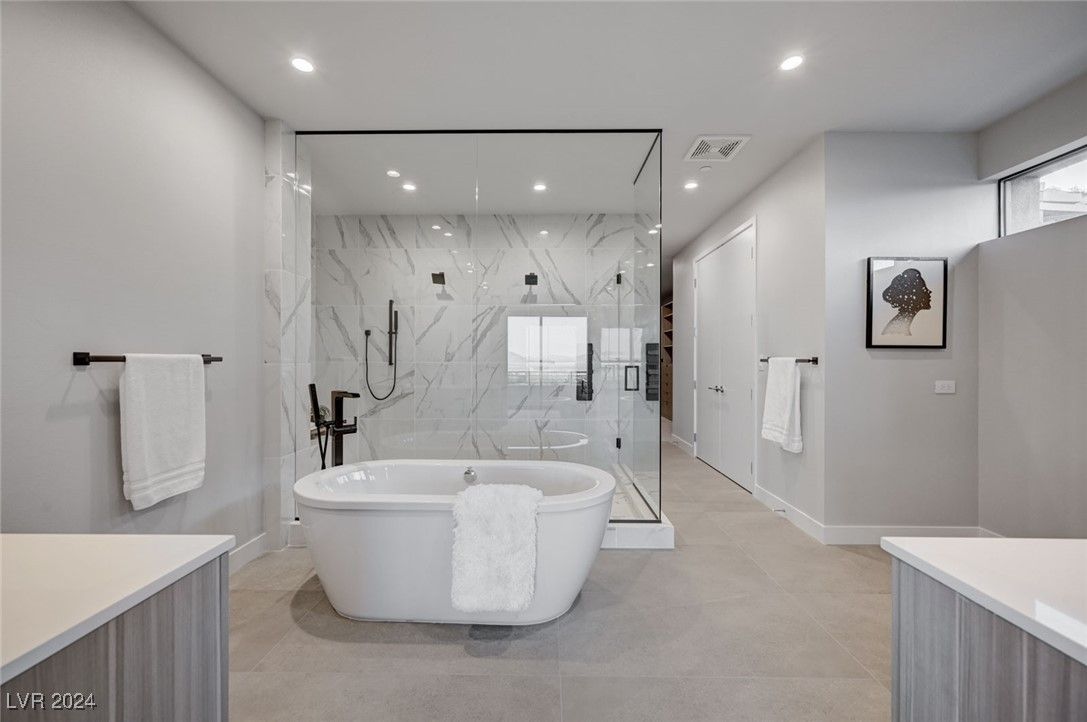 Bathroom, Free Standing Baths, Glass Shower, Interior, Marble Walls, Recessed Lighting