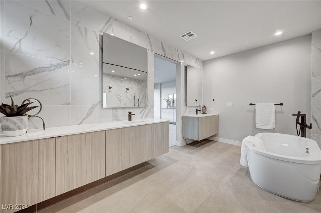 Bathroom, Dual Sink Vanities, Free Standing Baths, Interior, Marble Walls, Recessed Lighting