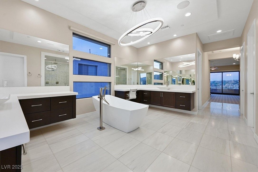 Bathroom, Dual Sink Vanities, Free Standing Baths, Glass Shower, Interior, Pendant Lights, Recessed Lighting, Wood Texture Flooring