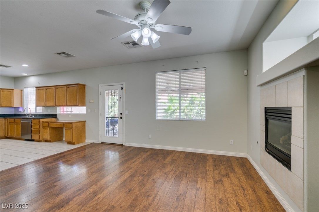 Empty room, Fireplace, Interior, Kitchen, Recessed Lighting, Wood Texture Flooring