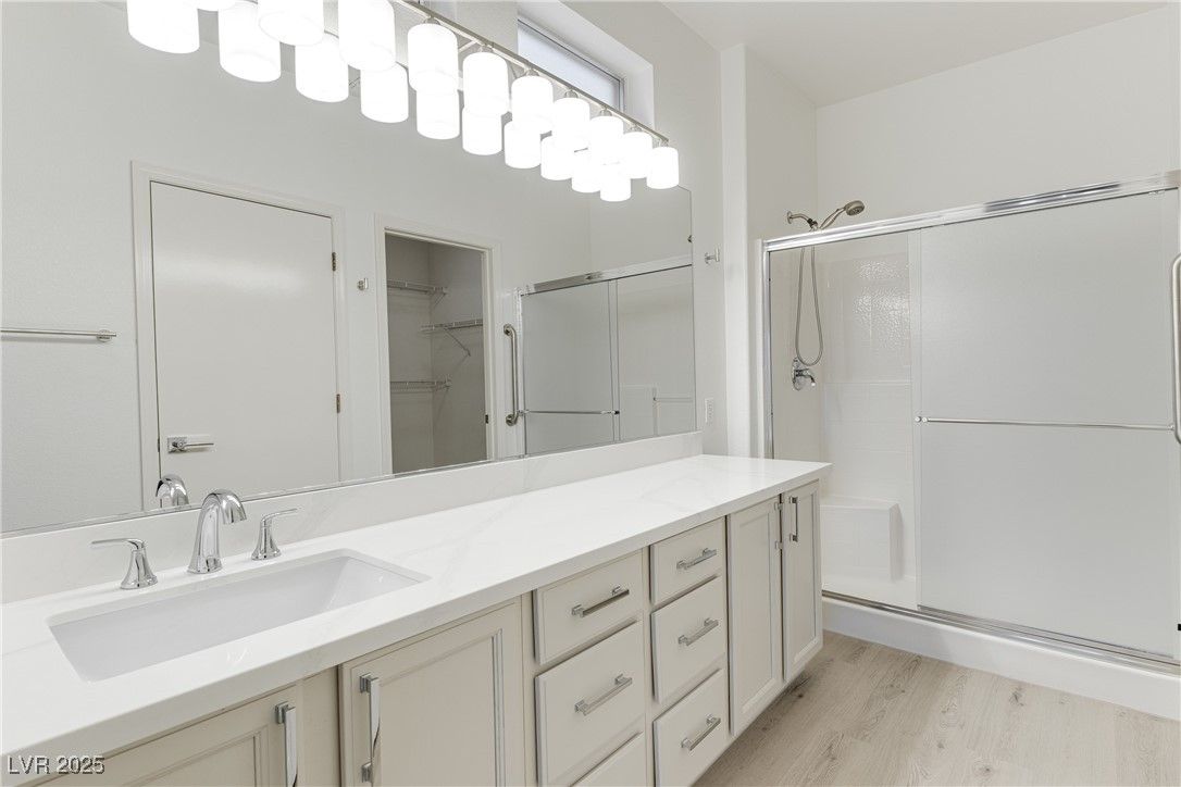 Bathroom, Dual Sink Vanities, Glass Shower, Interior, Wood Texture Flooring