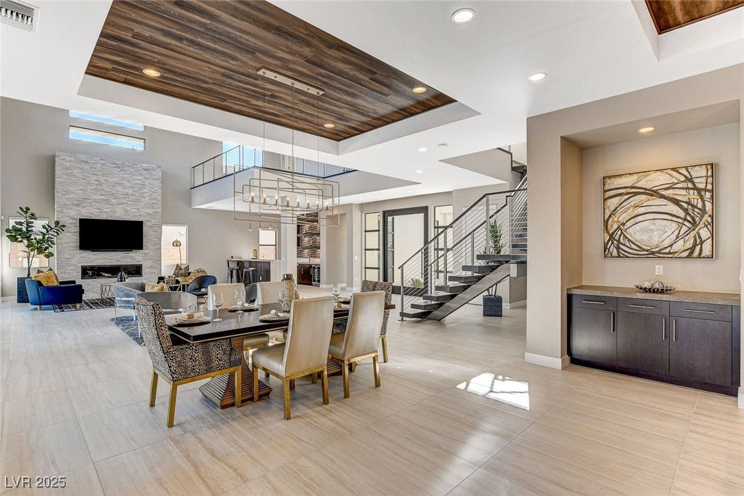 Chandelier, Dining room, Fireplace, Interior, Living room, Pendant Lights, Recessed Lighting, Wooden Ceilings
