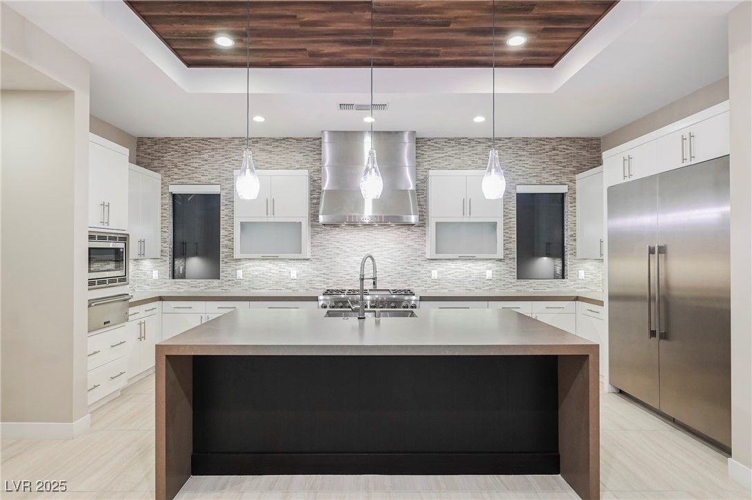 Interior, Kitchen, Pendant Lights, Recessed Lighting, Stainless Steel Appliances, Stone Walls