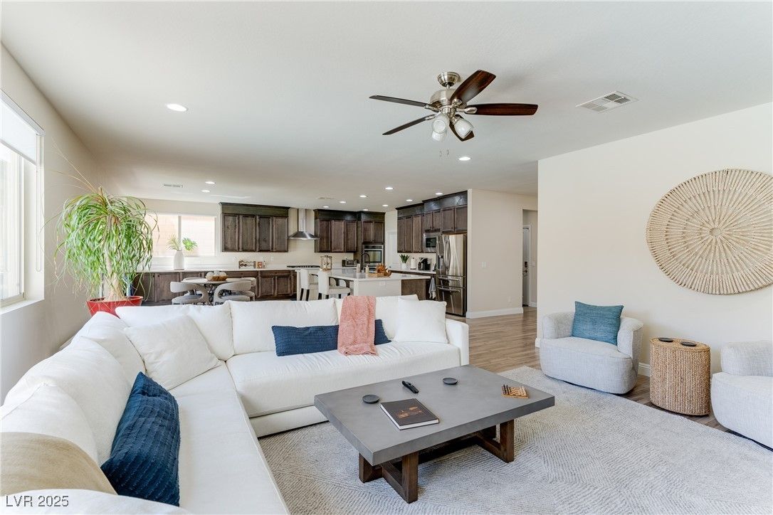Dining room, Interior, Kitchen, Living room, Recessed Lighting, Stainless Steel Appliances, Wood Texture Flooring