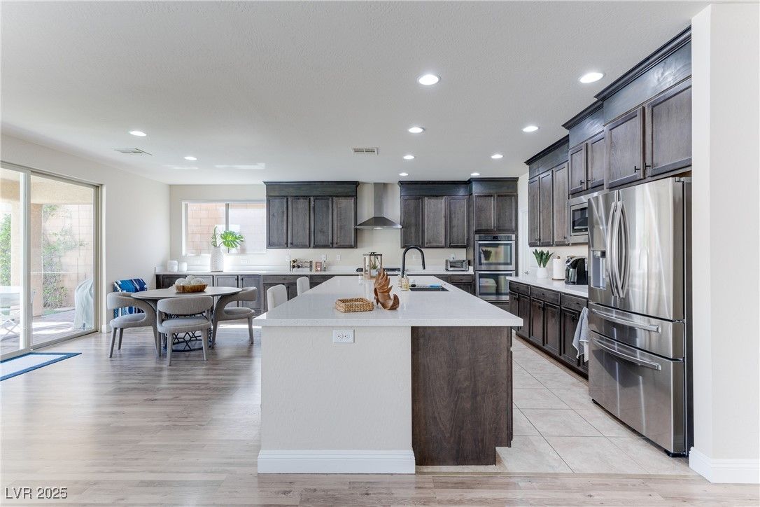 Dining room, Interior, Kitchen, Recessed Lighting, Stainless Steel Appliances, Wood Texture Flooring