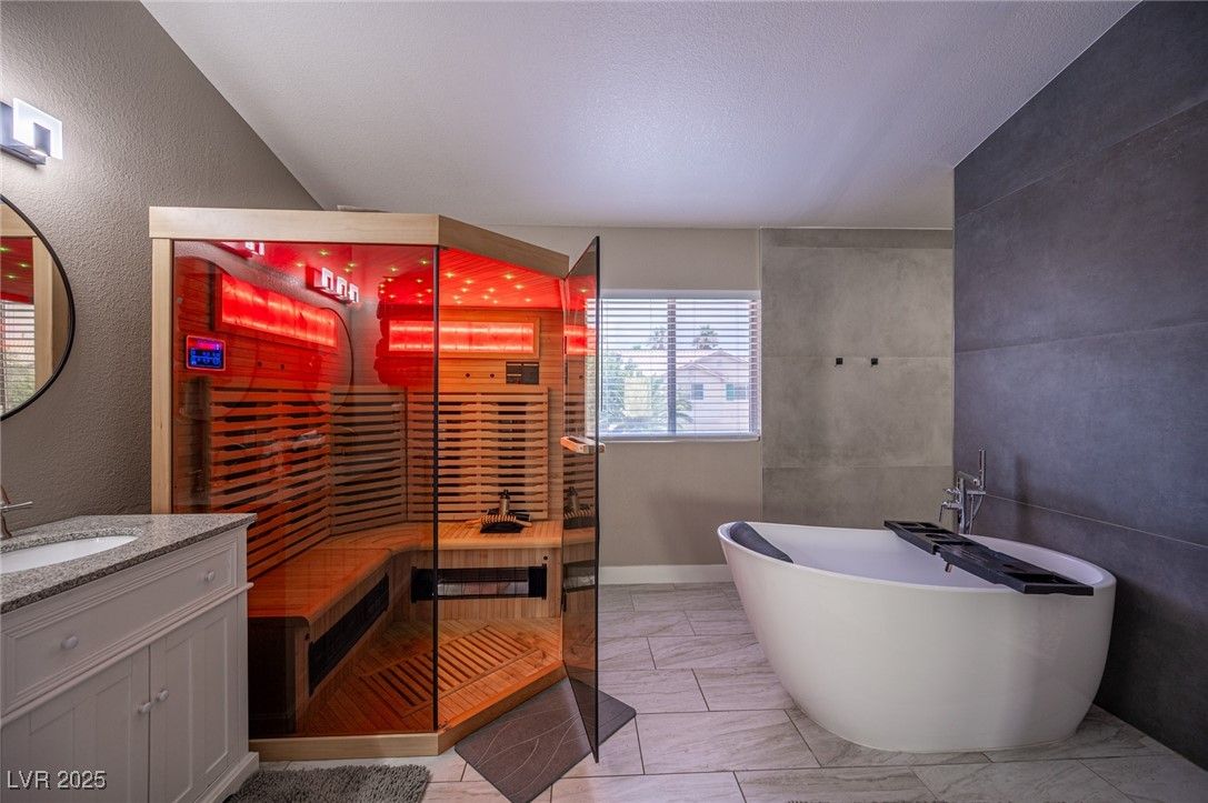 Bathroom, Free Standing Baths, Glass Shower, Interior, Marble, Recessed Lighting, Sauna Room