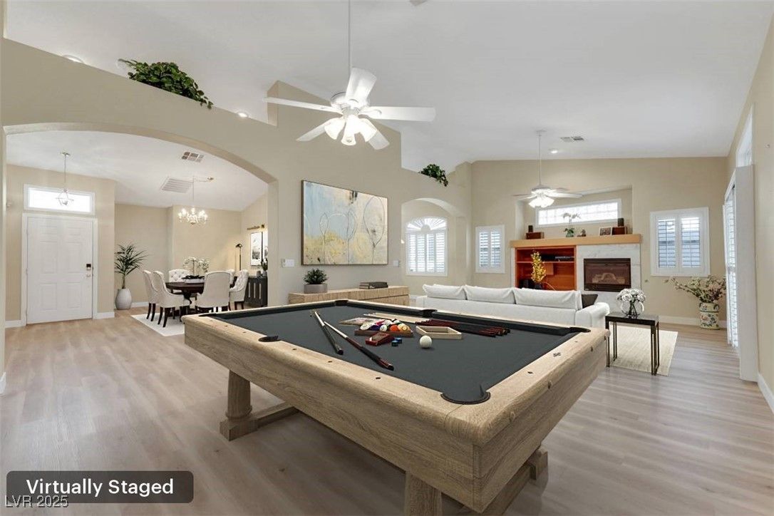 Billiard Table, Chandelier, Dining room, Fireplace, Game Room, Interior, Living room, Pendant Lights, Wood Texture Flooring