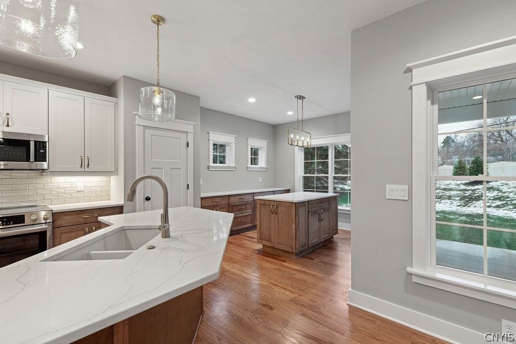 Interior, Kitchen, Pendant Lights, Recessed Lighting, Stainless Steel Appliances, Wood Texture Flooring